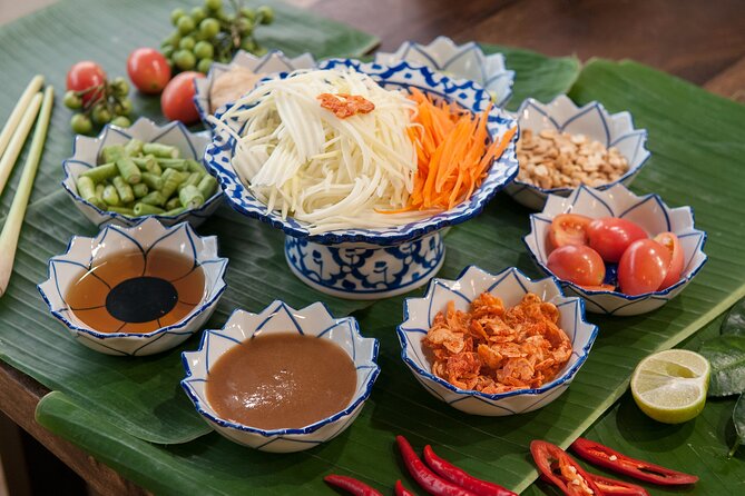Hands-on Thai Cooking Class & Market Tour in Sukhumvit - The chefs: April, Peach, and the teaching style