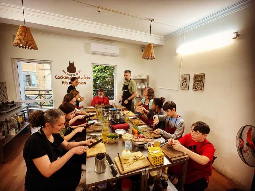 Hanoi: 5 Local Dishes Cooking Class with Meal & Market Visit - Sitting down to eat what you prepared