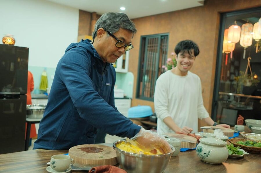 Hanoi Cooking Class: Market Tour, Free Recipe & Beverages - A welcoming kitchen with several named chefs