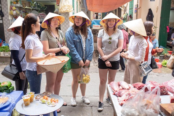 Hanoi Maya Kitchen: Traditional Cooking Class & Market Tour - Balancing sweet and sour in papaya salad