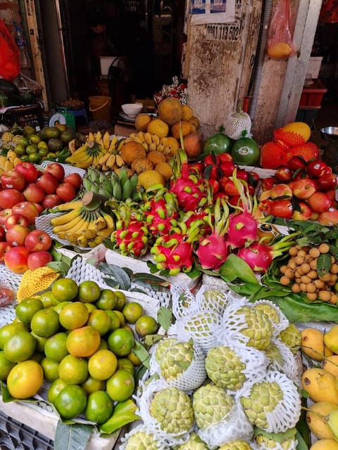 HCMc:Vietnamese Cooking Class with Local market tour & Meal - Sitting down to eat what you prepared