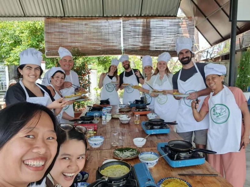 Hoi An Coconut Boat, Lantern Making & Cooking Class Organic - Picking ingredients before the cooking class