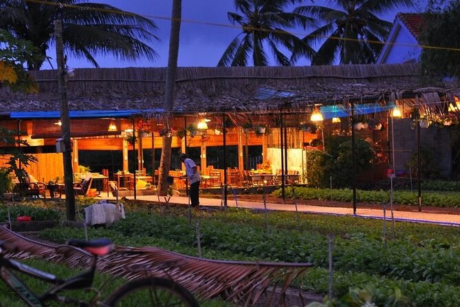 Hoi An Cooking Class With Market Tour and Bamboo Basket Boat Ride - A round bamboo boat through Bay Mau Coconut Village