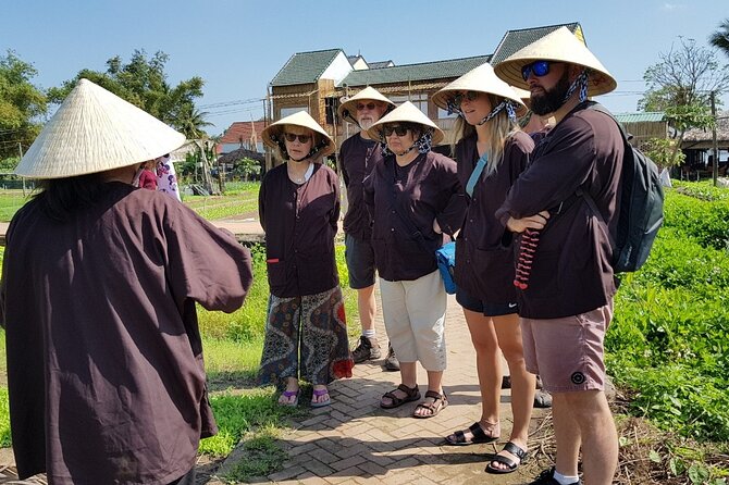 Hoi An Cooking Class With Market Tour and Bamboo Basket Boat Ride - Shopping for herbs and spices in a Hoi An market