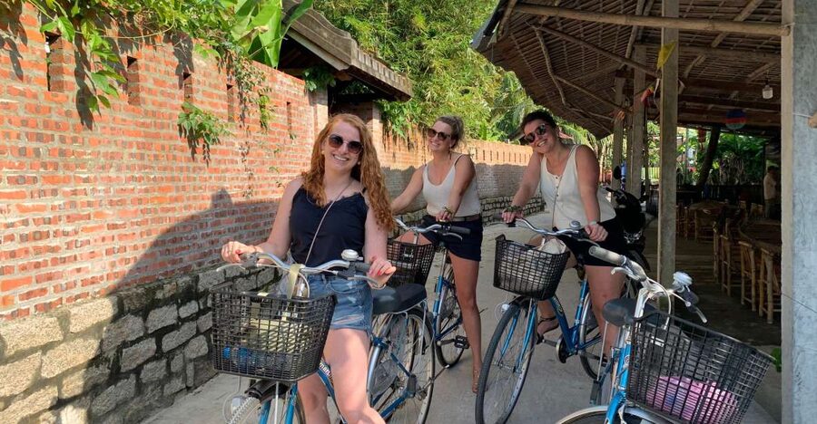 Hoi An Countryside Bicycle Tour - Farming - Cooking Class - Cycling through fields and areca gardens