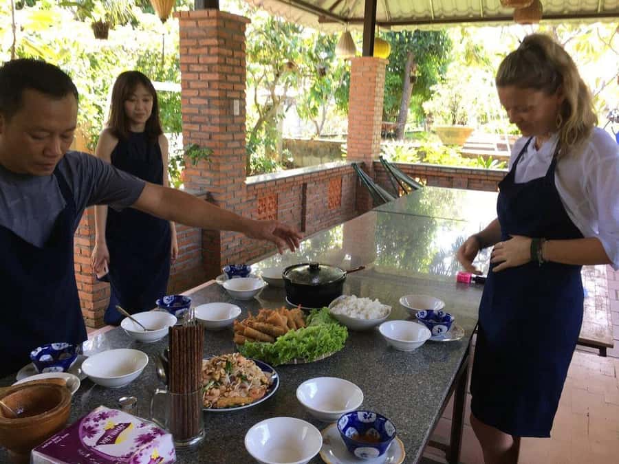 Hoi An: Tra Que Herb Village Cooking Class - Cooking among the herbs in Tra Que