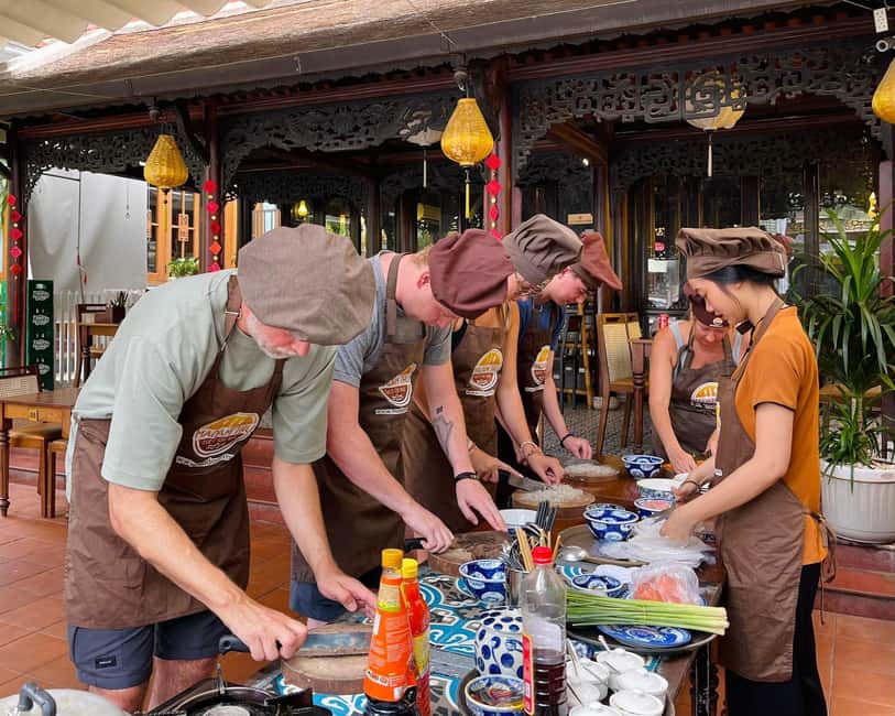 Hue City: Cyclo, Market Tour & Cooking Class at Madam Thu - Crossing the Perfume River by cyclo