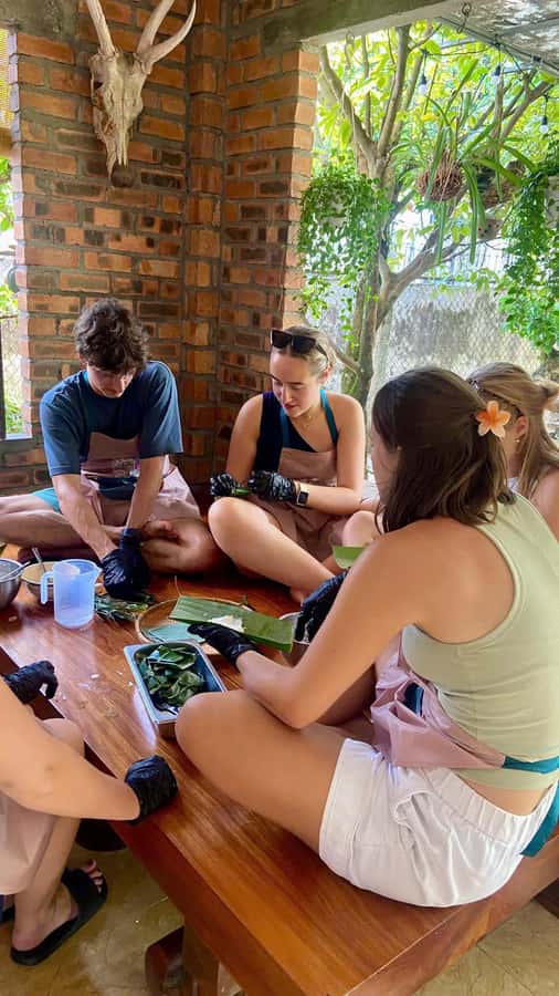 Hue: Traditional Vietnamese Cooking Class - Royal tea, fruit, and the meal in the garden