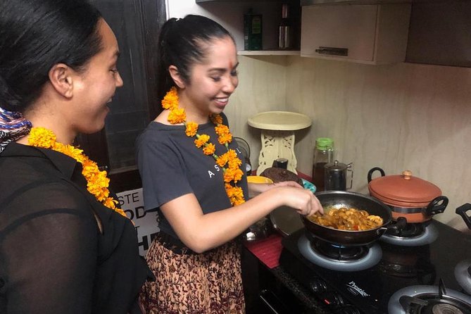 Interactive Cooking Class with a Local Family in Jaipur - Rolling chapati and preparing home-style curries