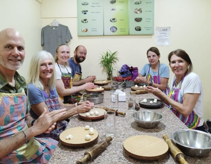 Kathmandu: Nepali Cooking Class with Hotel Pickup - Moving from market ingredients to the cooking table