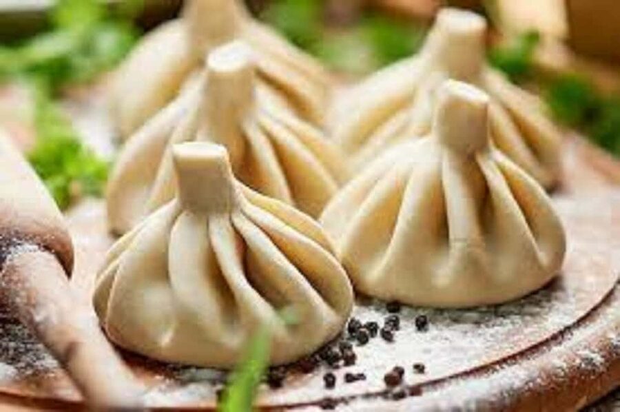 Khinkali & Khachapuri Cooking Classes with Wine Tasting - Folding khinkali one pleat at a time