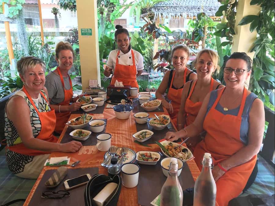 Koh Samui: Thai Cooking Class with Local Market Tour - Sitting down to eat what you made