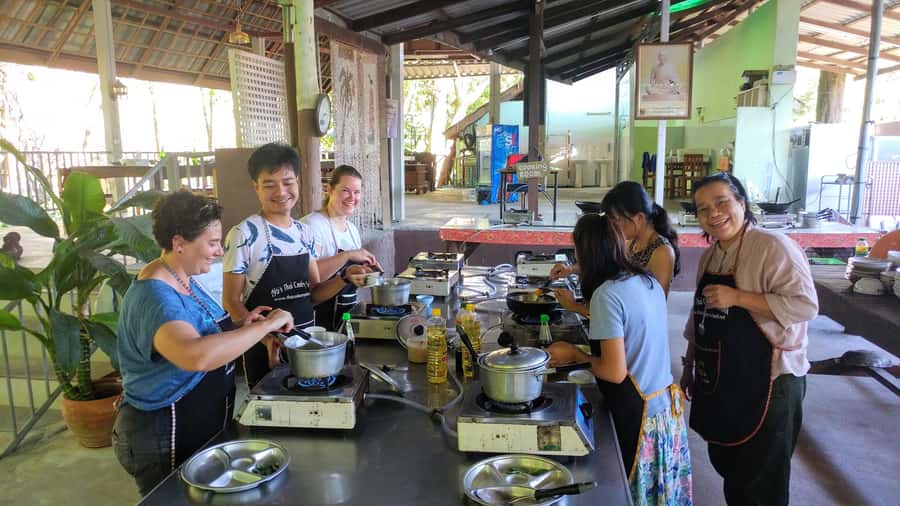 Krabi: Evening Thai Cooking Class at Ya's Cookery - Grinding Curry Paste in a Stone Mortar