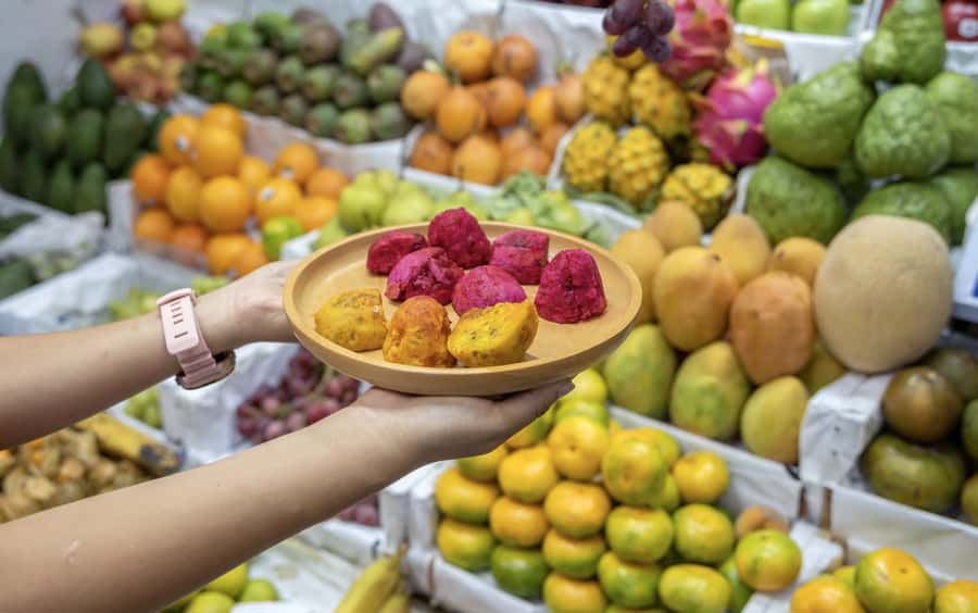 Lima: Market Tour and Cooking Class with Pisco Sour - Preparing ceviche with citrus, fish, and Peruvian garnishes