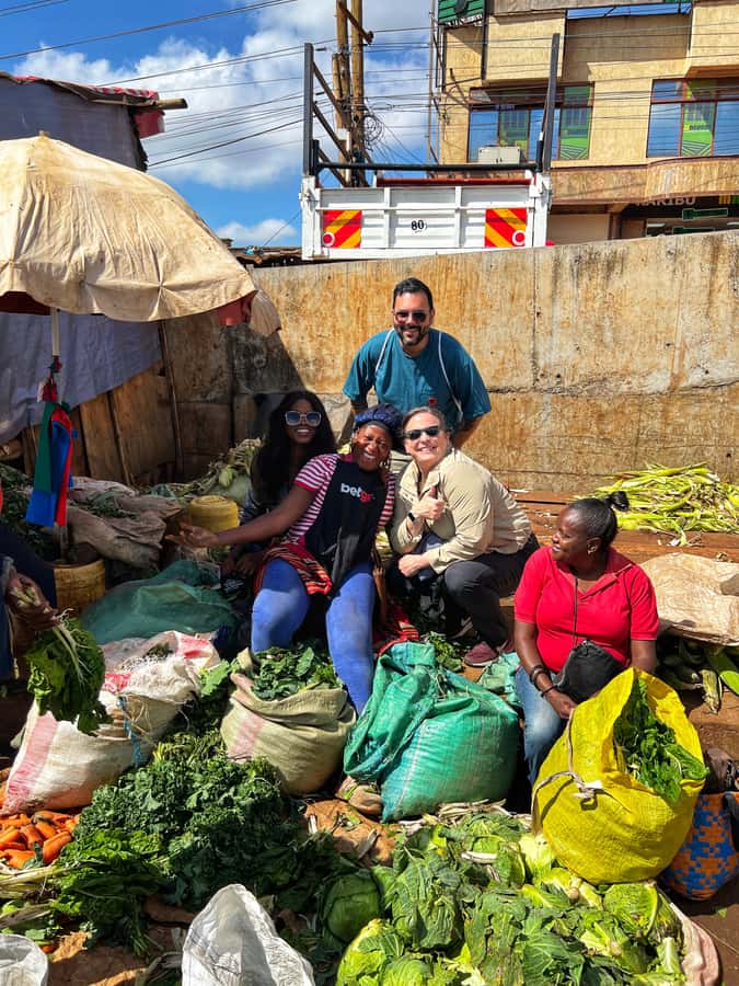Local Market Tour and Traditional Meal Cooking Class - Shopping for fresh food in a Kenyan market