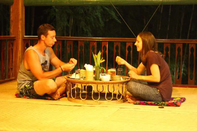 Luang Prabang: Evening Cooking Class & Local Baci Ceremony - Eating together beside the rice fields