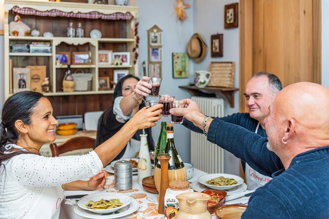 Lucca Walking Tour & Traditional Cooking Class with Wine - Lunch, wine, and the Italian pace of eating