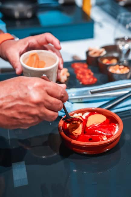 Madrid: Tapas Cooking Class with bottomless Wine Pairing - Key points at a glance
