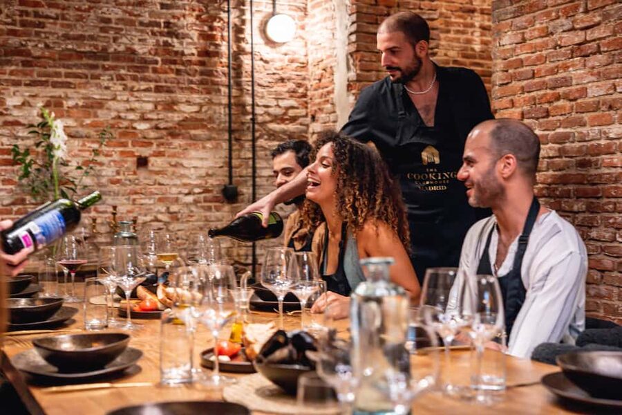 Madrid: Tapas Cooking Class with bottomless Wine Pairing - Starting with cava, cheese, and charcuterie