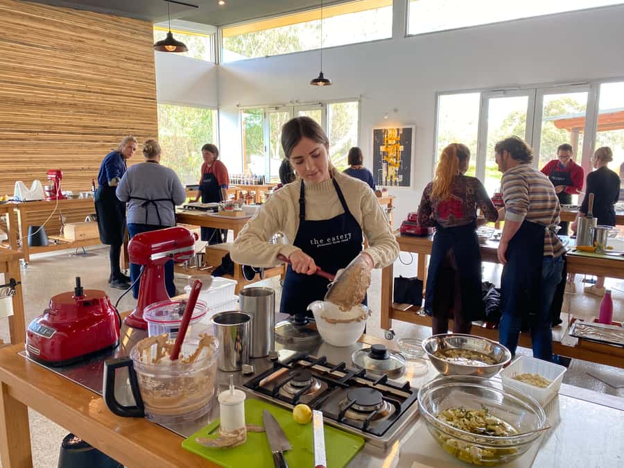 Maggie Beer's Farm Hands-on Cooking School and Lunch - Putting on an apron and cooking one course