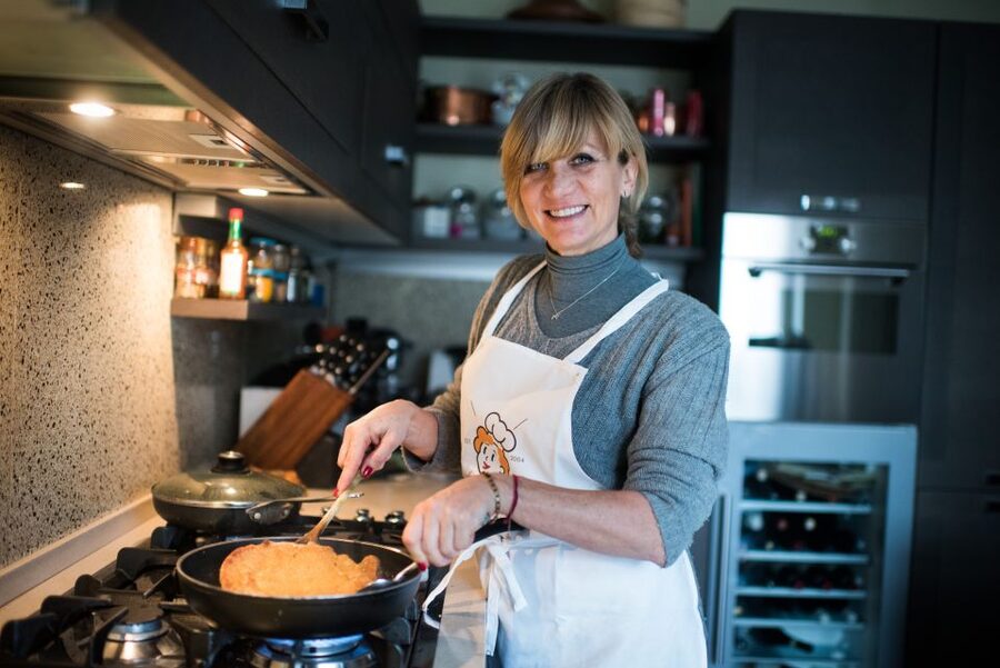 Milan: Market and Cooking Class at a Local's Home - Entering a private family kitchen