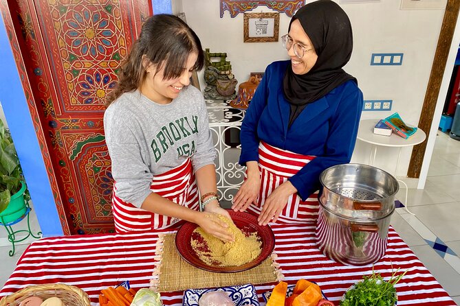 Moroccan Cooking Class with a Local Family & Market Visit - Sitting down to eat what you made