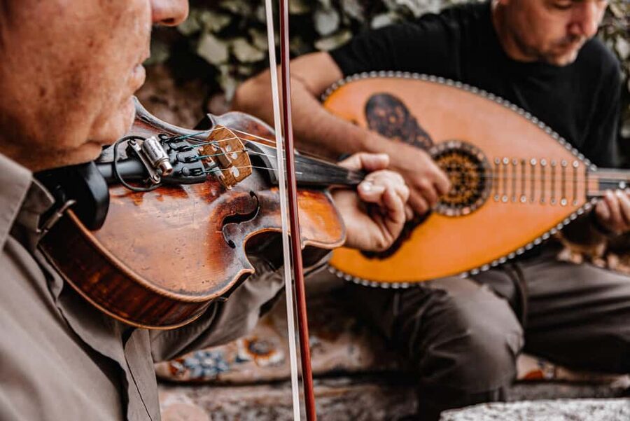 Naxos: Family Farm-table Cooking, Kouros Tour & Live Music - The old olive press and traditional methods