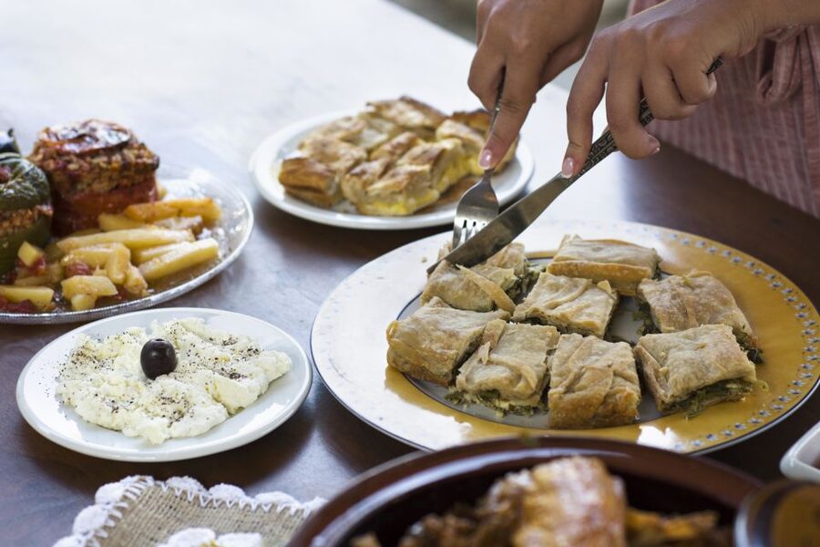 Naxos: Half-Day Cooking Class at Basiliko Family Tavern - Picking ingredients for traditional Naxian dishes