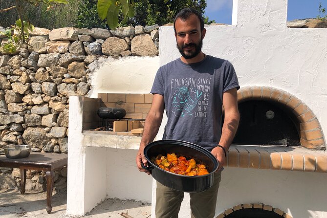 Naxos Perivoli Farm Experience & Wood-fire Cooking Class - A long table with a very large meal
