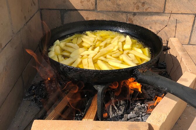 Naxos Perivoli Farm Experience & Wood-fire Cooking Class - Group size, guiding, and the family atmosphere
