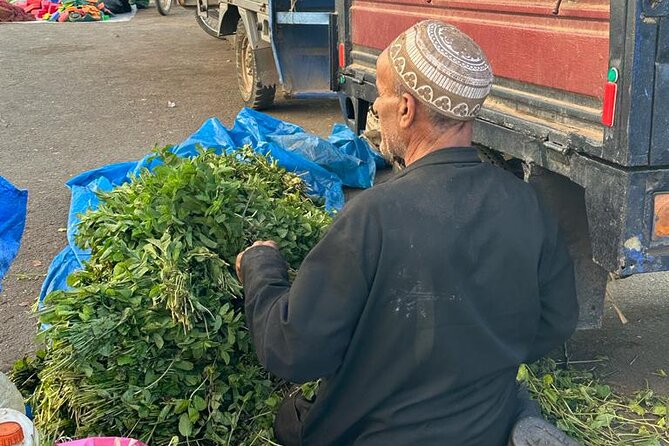 Old local Market visit+Moroccan cooking class with a local family - Mint tea, sweets, music, and the meal
