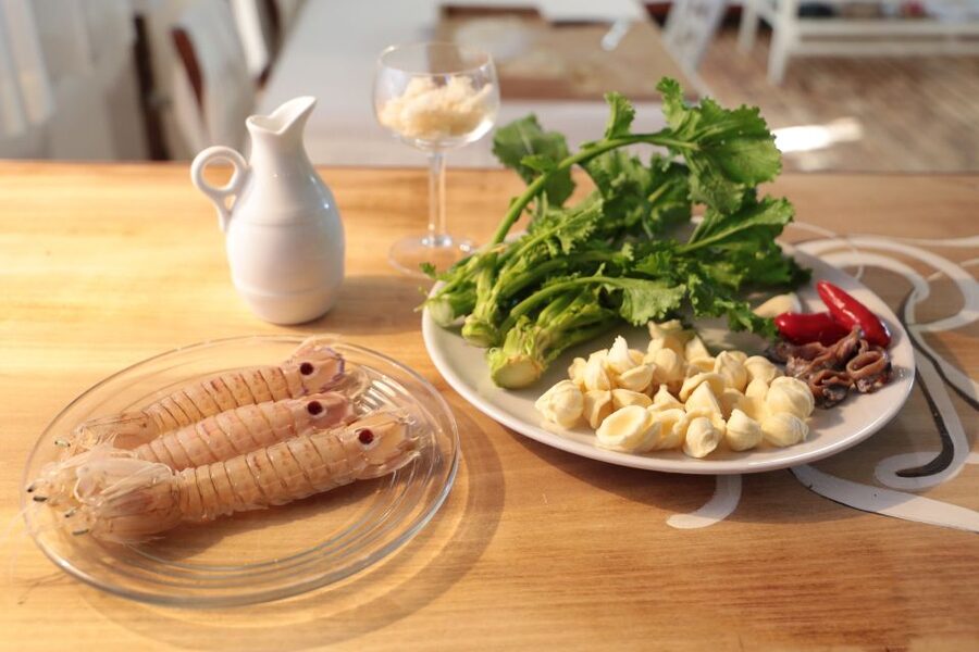 Ostuni: Cooking Class at a Local's Home - Sitting Down With Wine, Water, and Coffee