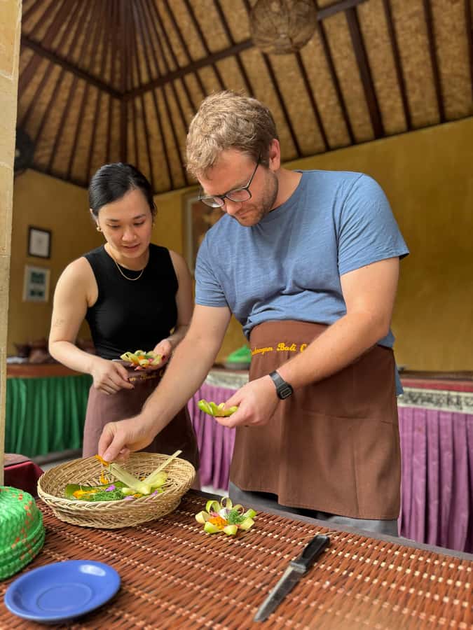 packages cooking class and romantic dinner in a local home - Making an offering before cooking