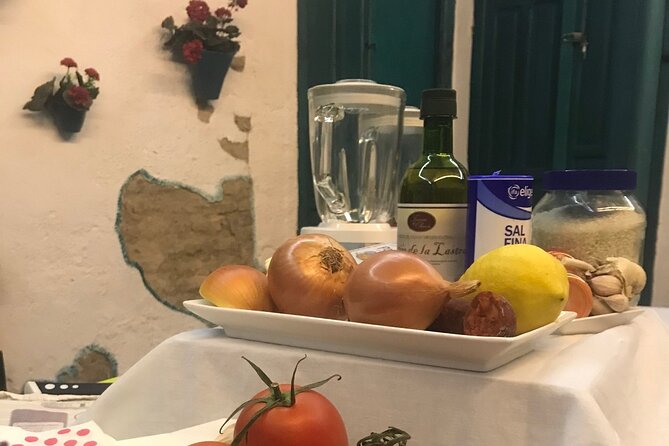 Paella and Salmorejo 2-Hour Cooking Class in Córdoba - Timing, meeting point, and cancellation details
