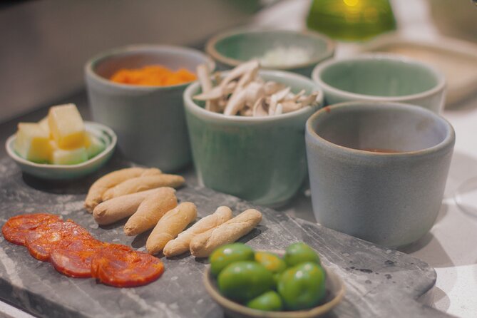Paella Cooking Class in Madrid with Bottomless Wine Pairing - The menu turns a cooking lesson into a full meal