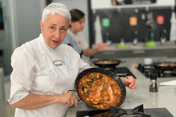 Paella Cooking Class in Malaga - Sitting down to eat what you made