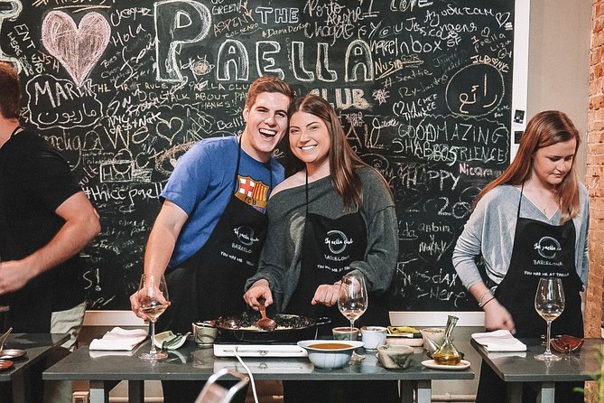 Paella Cooking Class with Professional Chef: Four Course Dinner - Sharing several paellas at the dinner table