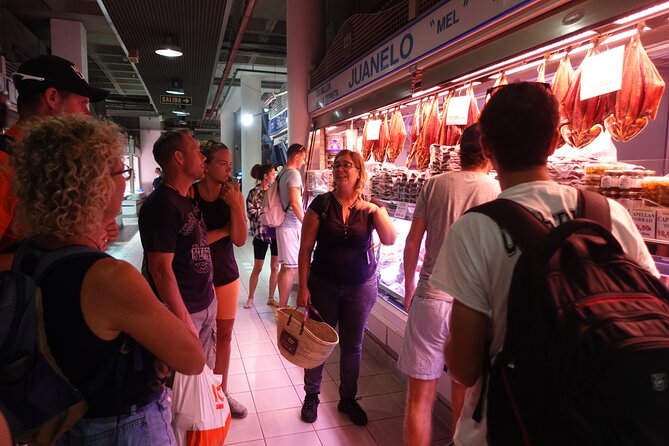 Paella & Sangria Class with Tapas and Market Visit - Sitting down to eat what you made