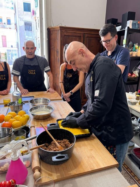 Palermo: Shopping at Capo Market and Sicilian Cooking Class - Cooking and eating your own Sicilian meal