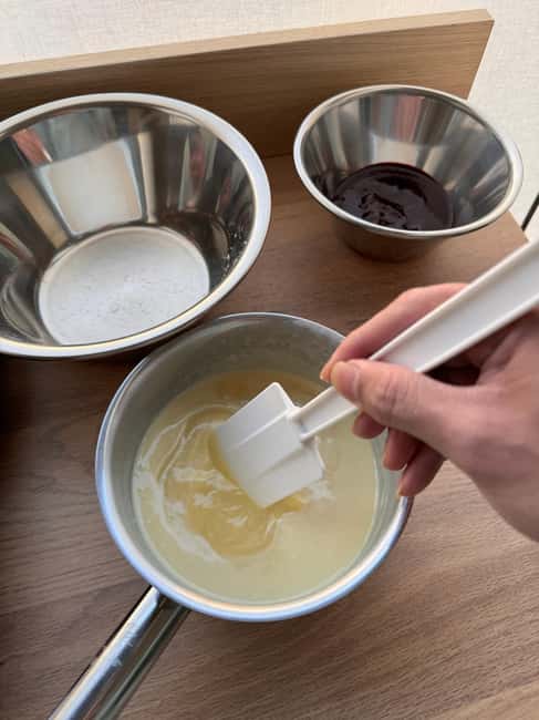 Paris: Macaron Baking Class in Central Paris - Mixing and piping the macaron shells