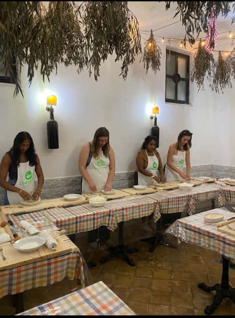 Pasta and tiramisù Cooking class with Wine at Piazza Navona - Sitting down to eat your own Roman meal