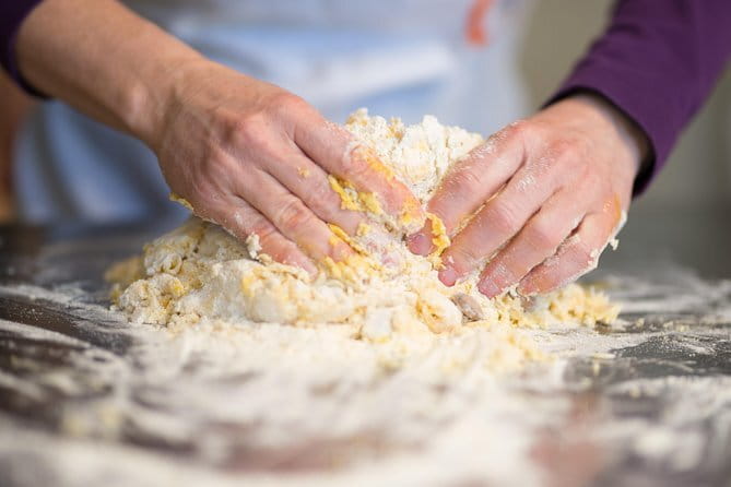 Pasta Cooking Class: Mastering Nonna's Recipes - Sitting down to three pasta dishes and wine