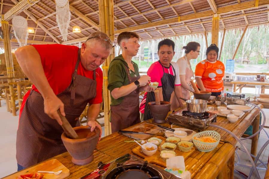 Phuket: Elephant Sanctuary Tour, Cooking Class & Lunch - Watching the elephants at the river