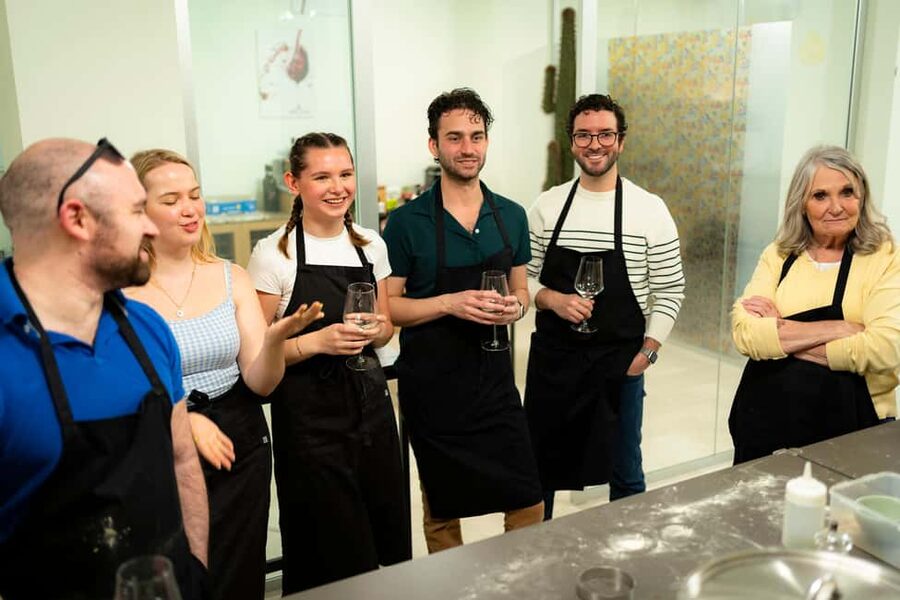 Pizza and Tiramisu Cooking Class with Wine in Milan - Topping, baking, and eating your own pizza