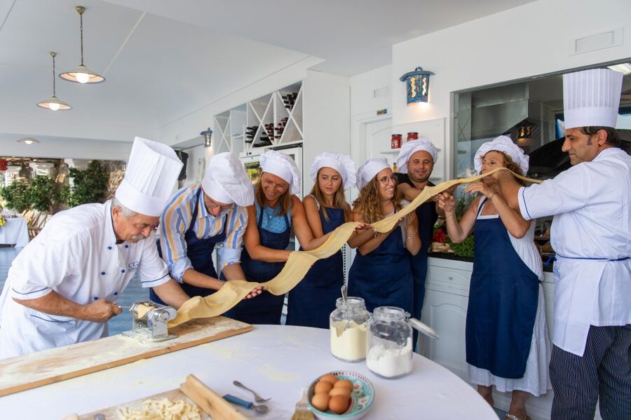 Praiano: Cooking Class with Dinner Overlooking the Sea - Making bruschetta, eggplant parmigiana, and pasta