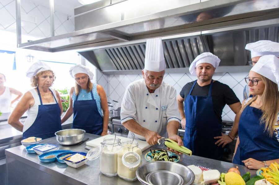 Praiano: Cooking Class with Dinner Overlooking the Sea - A welcome drink before the aprons go on