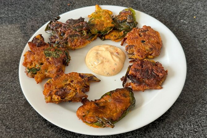 Private Authentic Indian Cooking Class in Antwerp with Aastha - Sitting down to eat what you made