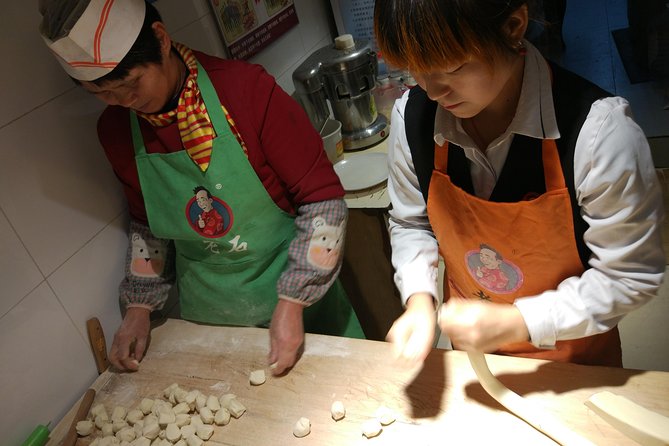 Private Hutong Culture Tour with Dumpling Cooking Class plus Cricket Fighting Game - A rickshaw ride into the old hutongs