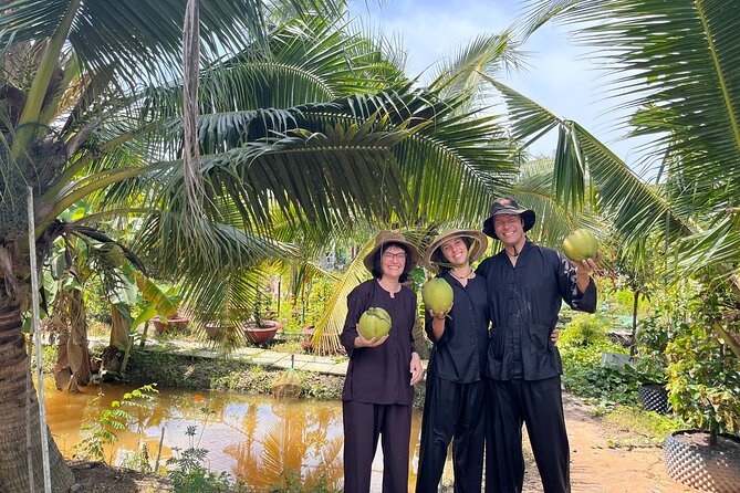 PRIVATE Mekong Delta 1 Day with Kayaking, Biking & Cooking - Honey tea, Southern music, and coconut candy