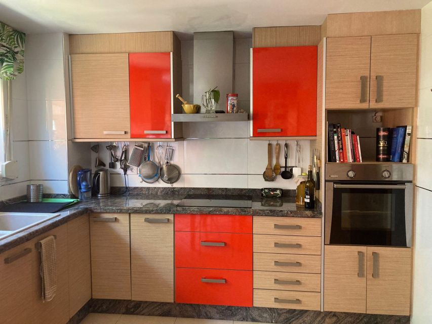 Private Paella & Tapas Cooking Class in a Local Chef's Home - Eating the meal you helped create